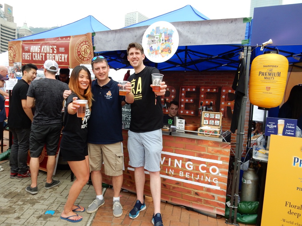 Rob in his original Craft Beer Asia shirt, raising a beer with local brewers at an Asian beer festival